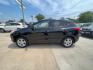 2010 BLACK HYUNDAI TUCSON GLS (KM8JUCAC9AU) with an 2.4L engine, Automatic transmission, located at 1100 W. Sheridan Ave., Shenandoah, 51601, (712) 246-1600, 40.765678, -95.388817 - Photo#2