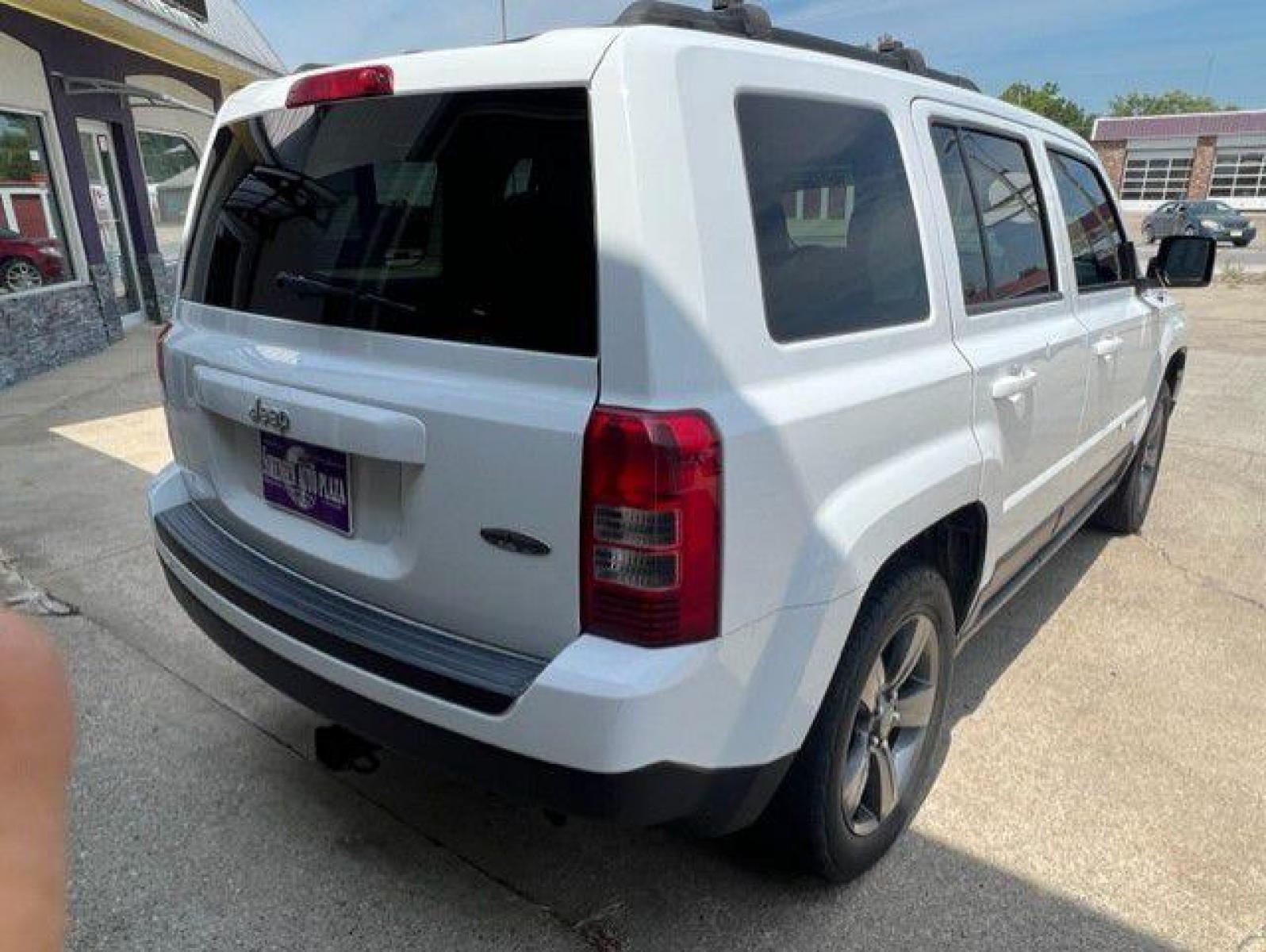 2015 WHITE JEEP PATRIOT LATITUDE (1C4NJRFB4FD) with an 2.4L engine, Continuously Variable transmission, located at 1100 W. Sheridan Ave., Shenandoah, 51601, (712) 246-1600, 40.765678, -95.388817 - Photo #1