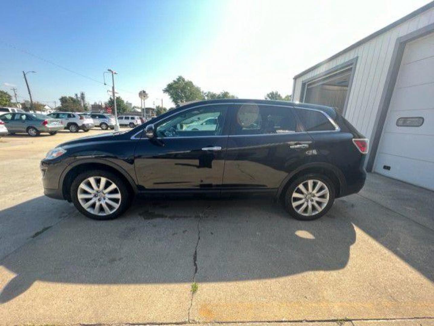 2010 BLACK MAZDA CX-9 Grand Touring (JM3TB3MA2A0) with an 3.7L engine, Automatic transmission, located at 1100 W. Sheridan Ave., Shenandoah, 51601, (712) 246-1600, 40.765678, -95.388817 - Photo#2